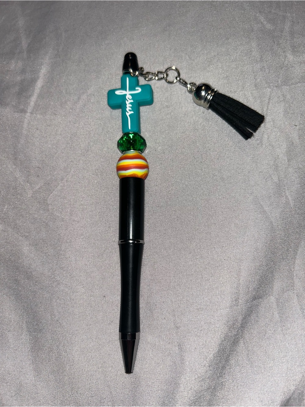 Decorative Black Ballpoint Pen with Teal Cross Charm and Tassel